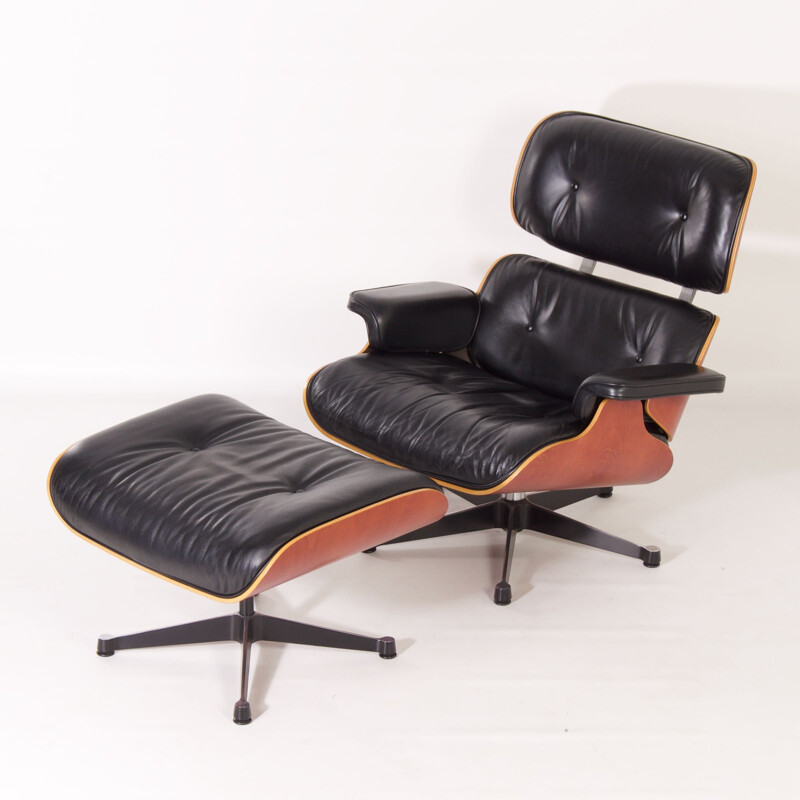 Vintage armchair with ottoman by Charles & Ray Eames for Vitra, 1990s