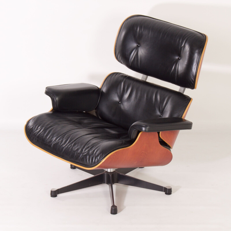 Vintage armchair with ottoman by Charles & Ray Eames for Vitra, 1990s