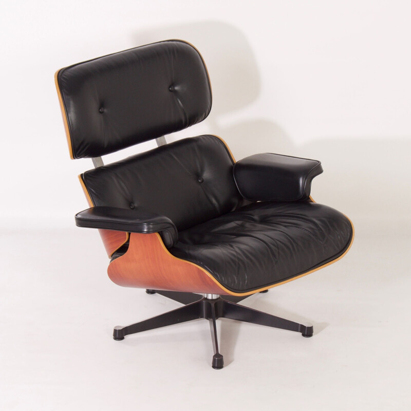 Vintage armchair with ottoman by Charles & Ray Eames for Vitra, 1990s