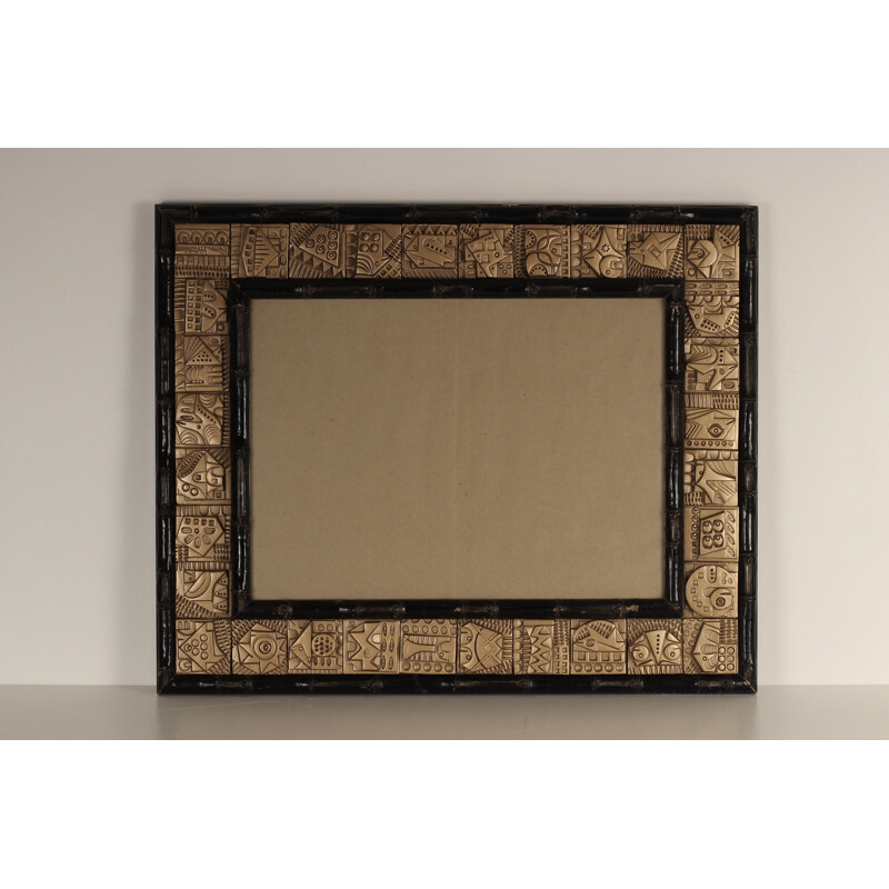Mid-century faux bamboo frame with relief tile border by Ron Hitchins