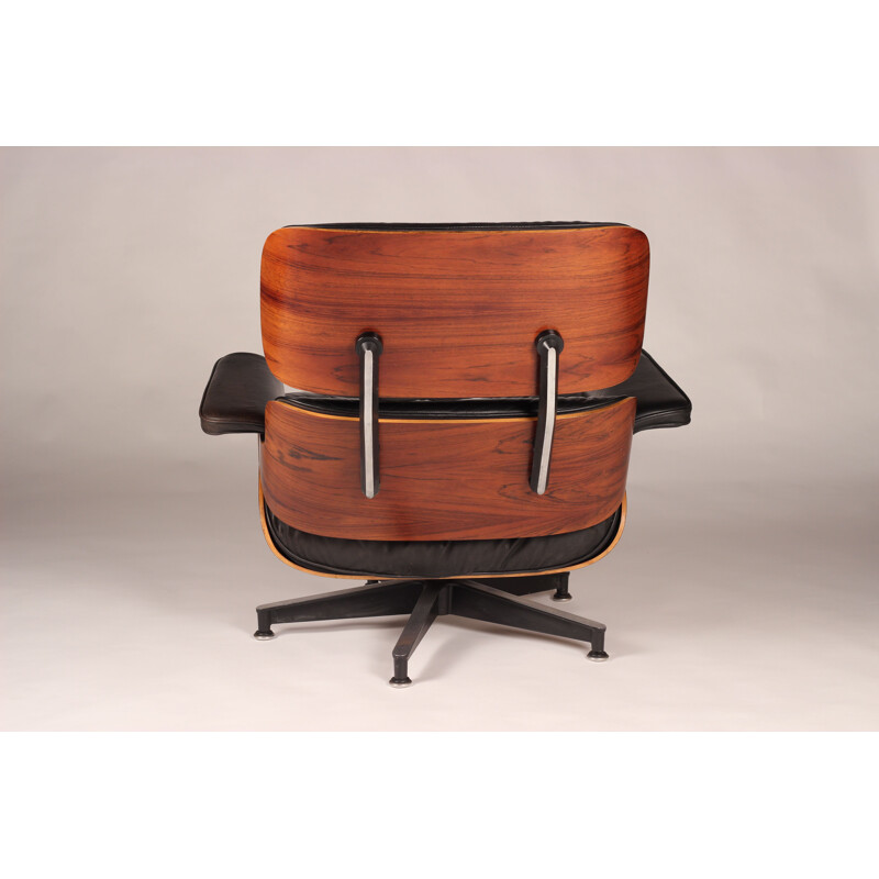 Vintage 670 rozenhout en lederen fauteuil van Charles en Ray Eames voor Herman Miller
