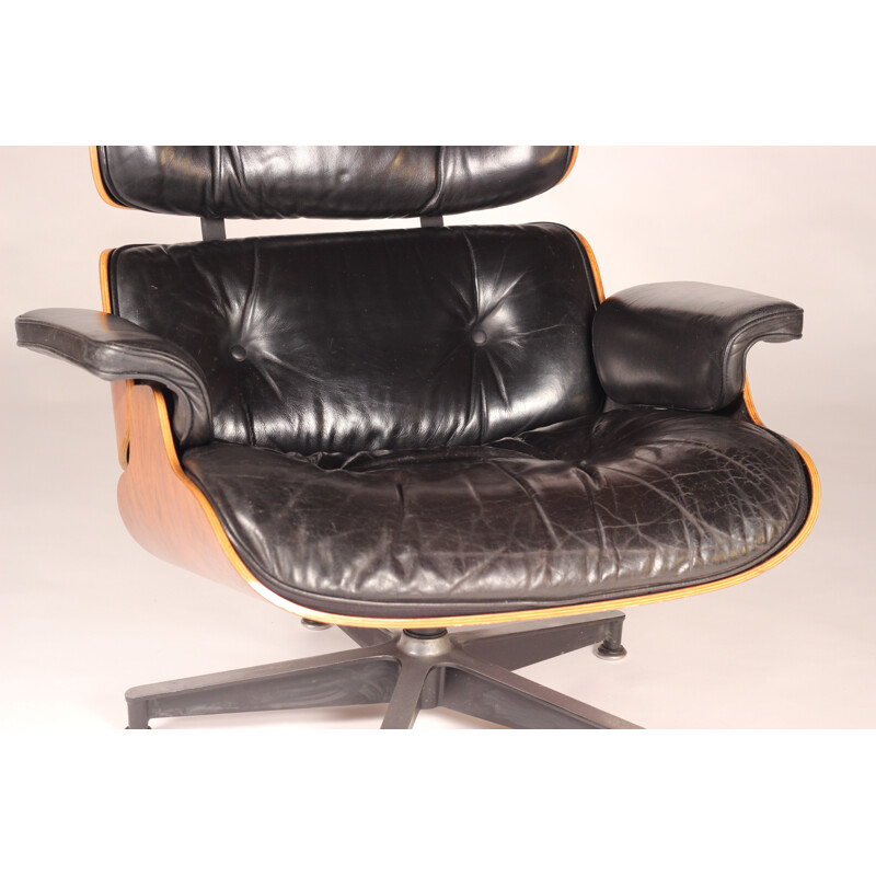 Vintage 670 rozenhout en lederen fauteuil van Charles en Ray Eames voor Herman Miller