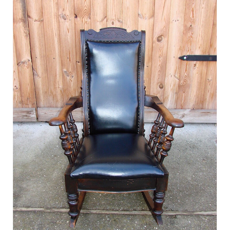 Mid century rocking chair in oak wood and natural leather