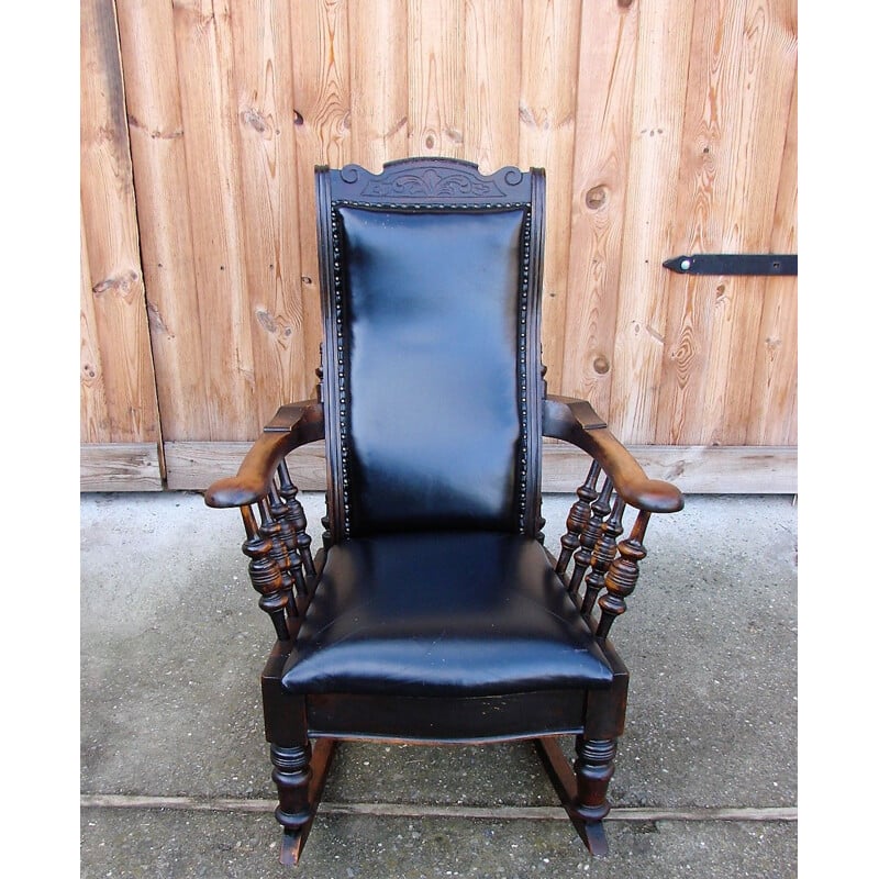 Mid century rocking chair in oak wood and natural leather