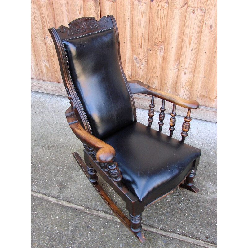 Mid century rocking chair in oak wood and natural leather