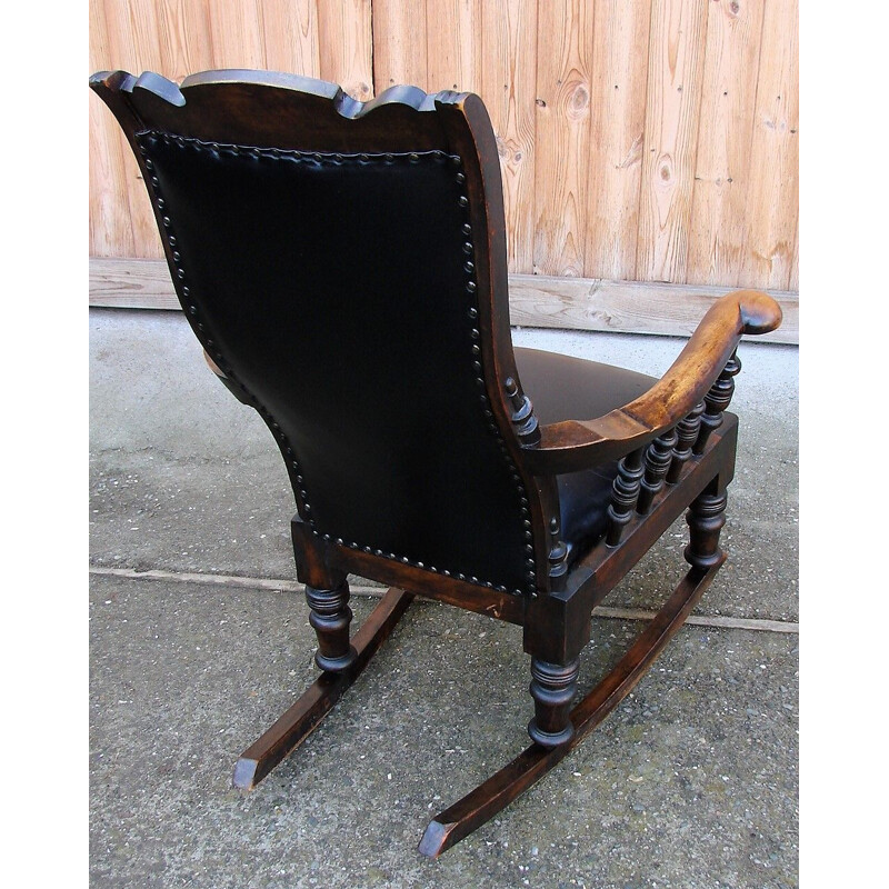 Mid century rocking chair in oak wood and natural leather