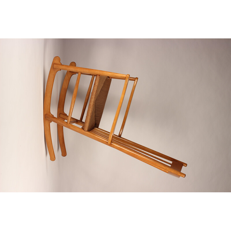 Silla mecedora escandinava vintage J16 en madera de haya y cuerda danesa de Hans Wegner para Fdb Moble, 1950