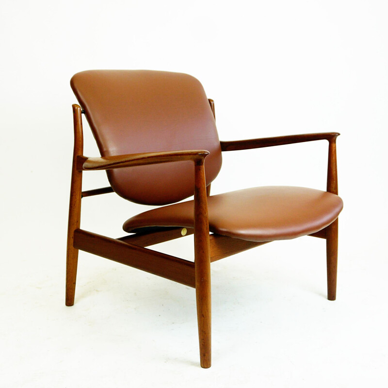Vintage Deense fauteuil in teak en bruin leer van Finn Juhl voor France et Son