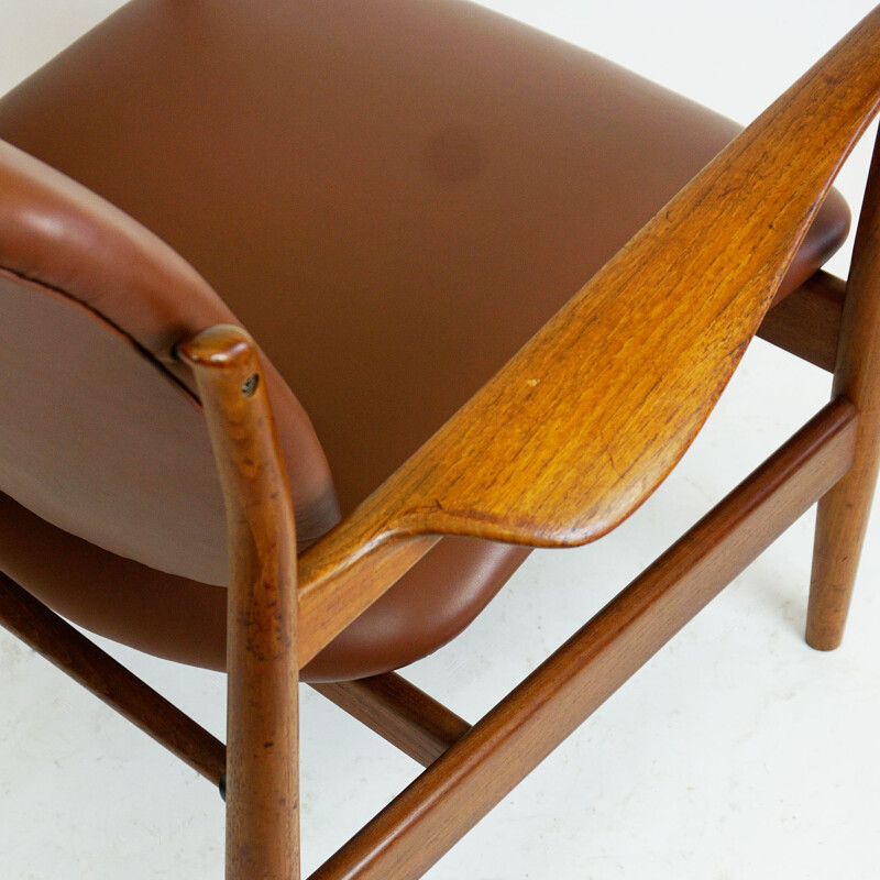 Danish vintage teak and brown leather armchair by Finn Juhl for France and Son