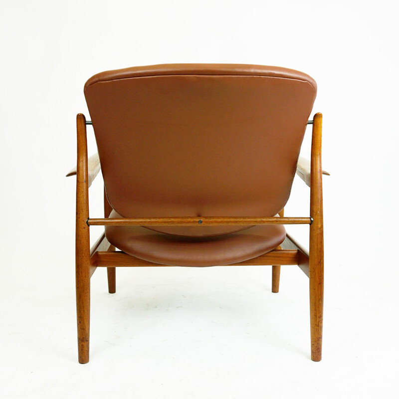 Sillón danés vintage de teca y cuero marrón de Finn Juhl para France et Son