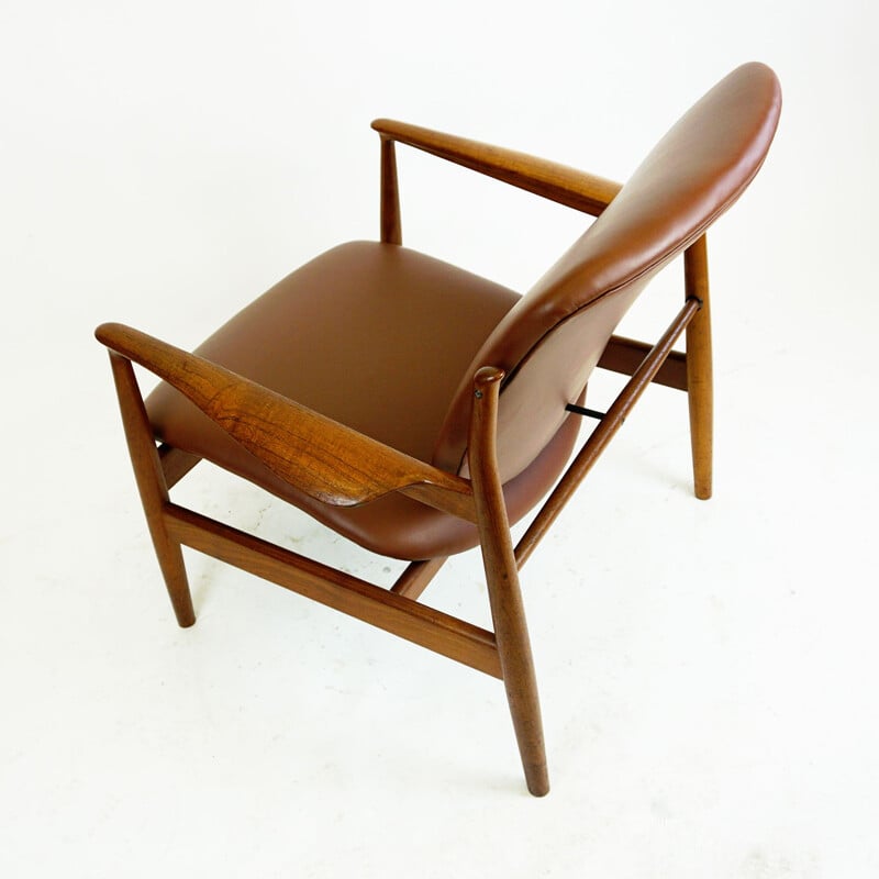 Danish vintage teak and brown leather armchair by Finn Juhl for France and Son