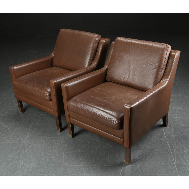 Scandinavian pair of armchairs in leather - 1960s