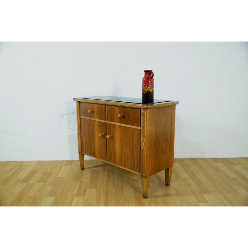 Small storage cabinet with black glass - 1950s