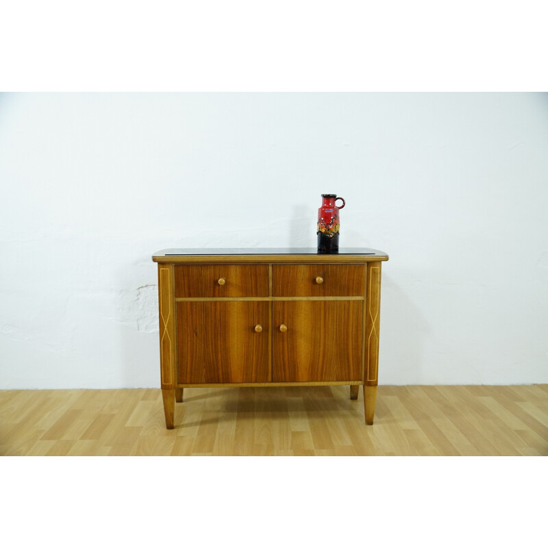 Small storage cabinet with black glass - 1950s