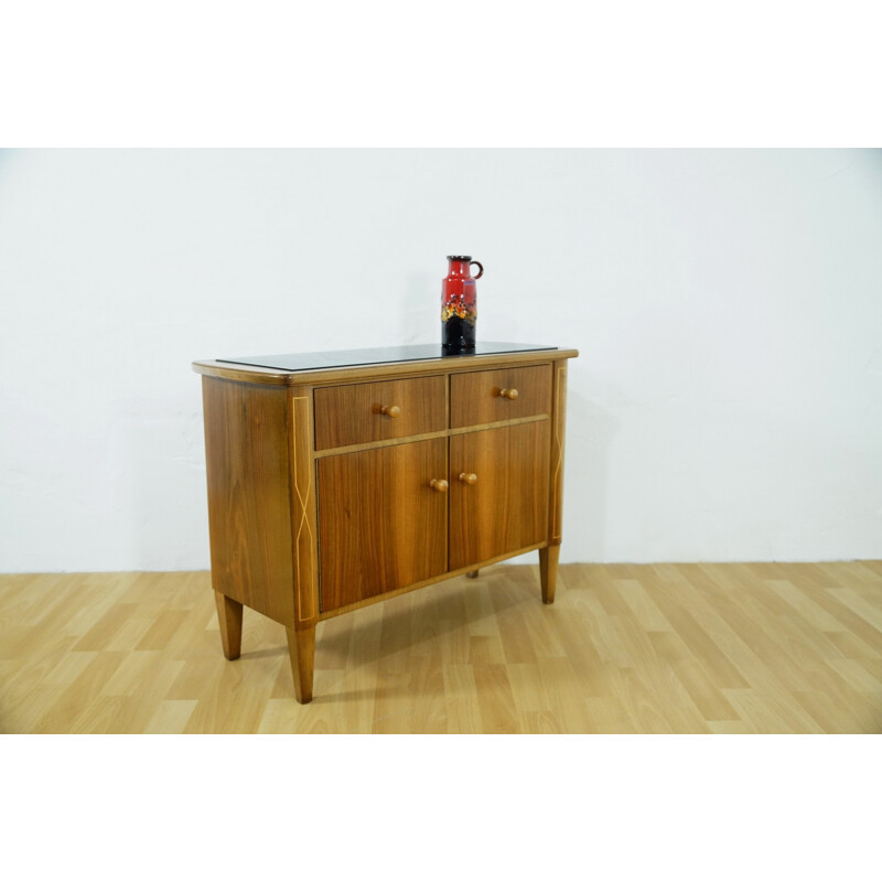 Small storage cabinet with black glass - 1950s