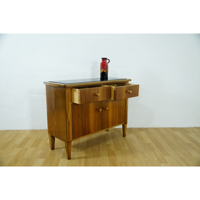 Small storage cabinet with black glass - 1950s