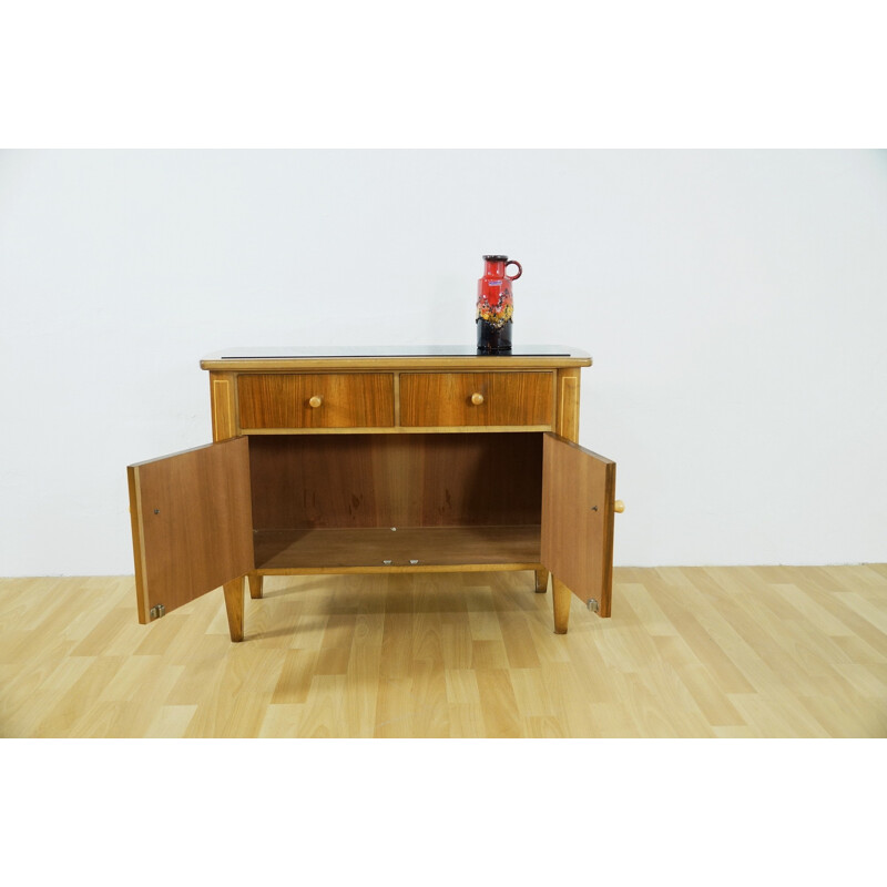 Small storage cabinet with black glass - 1950s