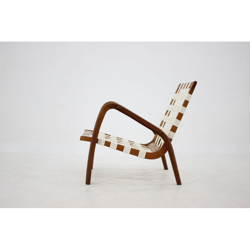 Vintage oakwood armchair by Jan Vanek for Krasna Jizba, Czechoslovakia 1940s