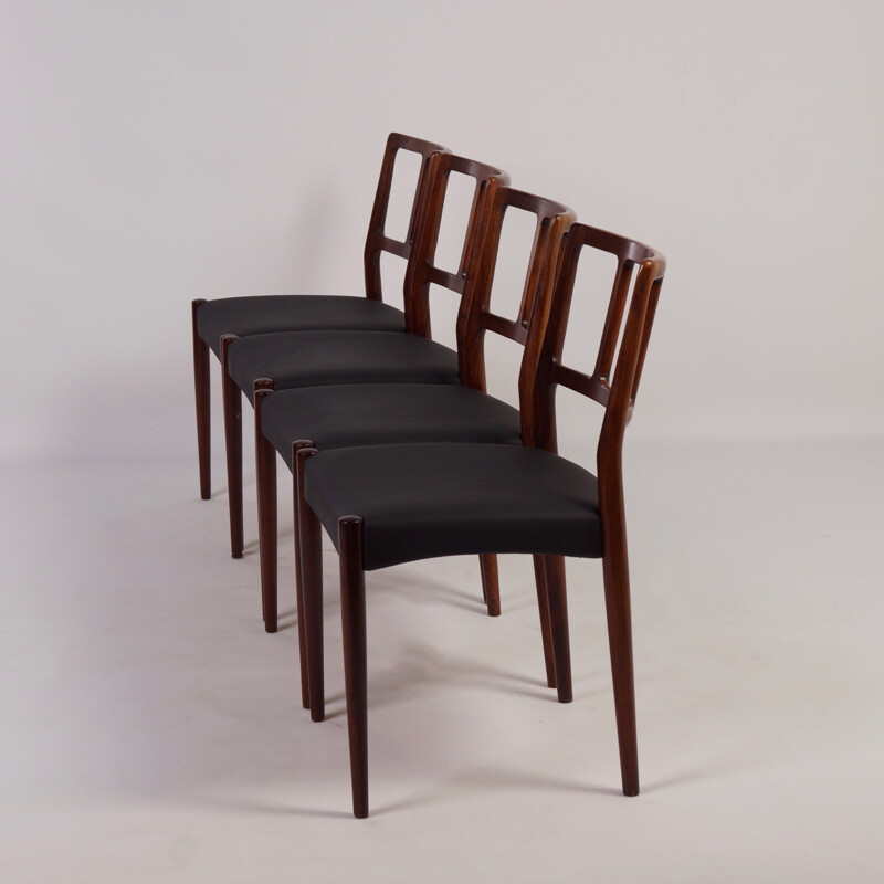 Set of 4 Uldum Møbelfabrik dingin chairs in rosewood and black leatherette, Johannes ANDERSEN - 1960s