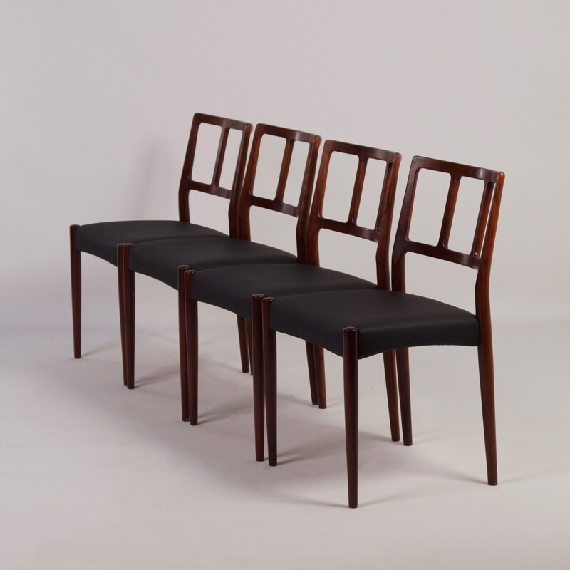 Set of 4 Uldum Møbelfabrik dingin chairs in rosewood and black leatherette, Johannes ANDERSEN - 1960s