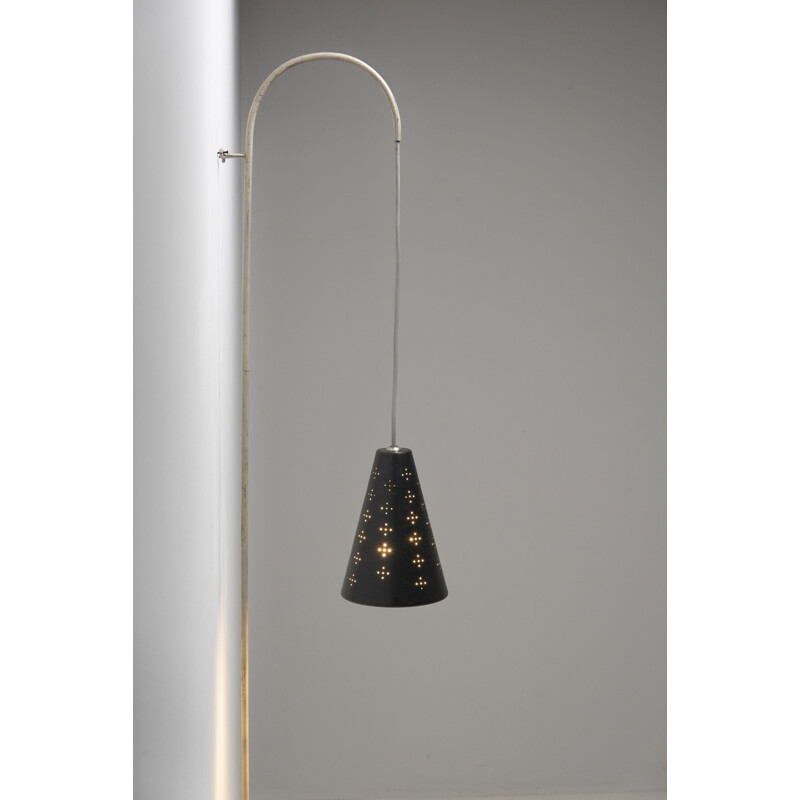 Vintage wall lamp with black perforated cap