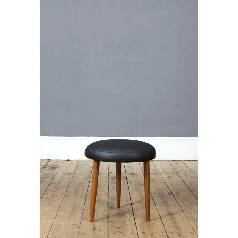 Round tripod foot stool in teak and black leatherette - 1960s