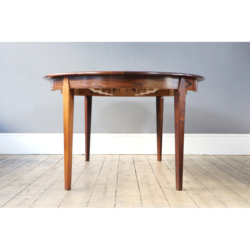 Round dining table in solid rosewood - 1960s