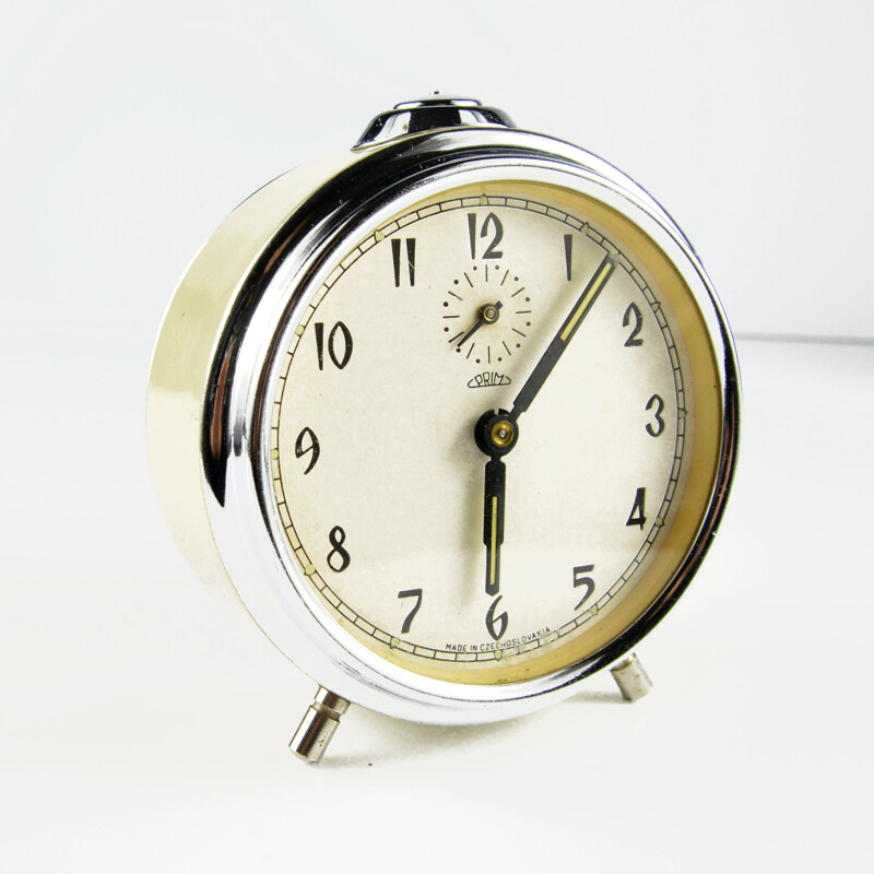 Vintage prim mechanical alarm clock in chrome steel and glass, Czech 1960