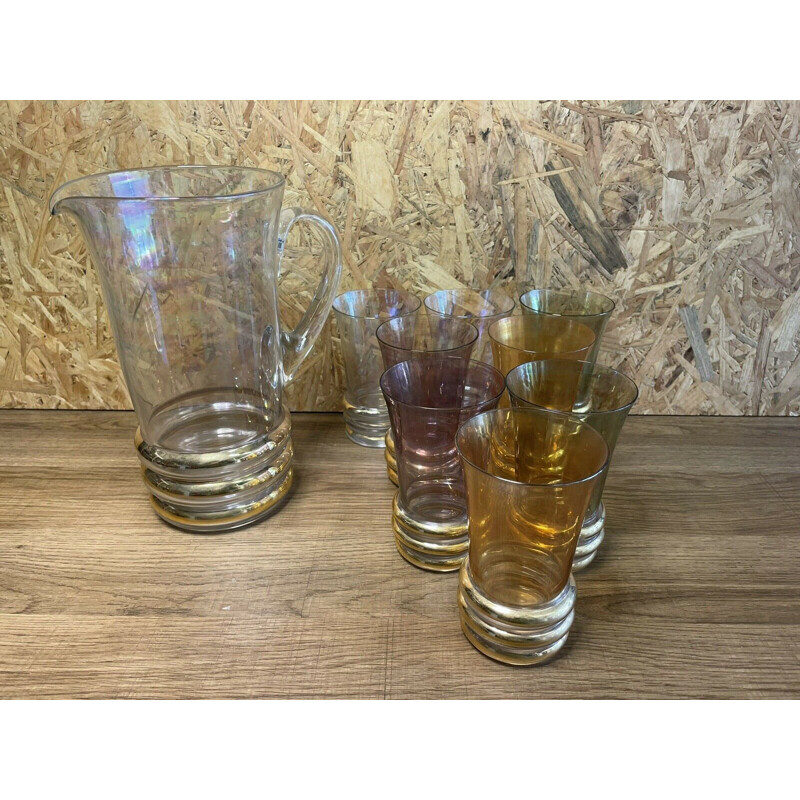 Set of pitcher and 8 vintage gold glasses