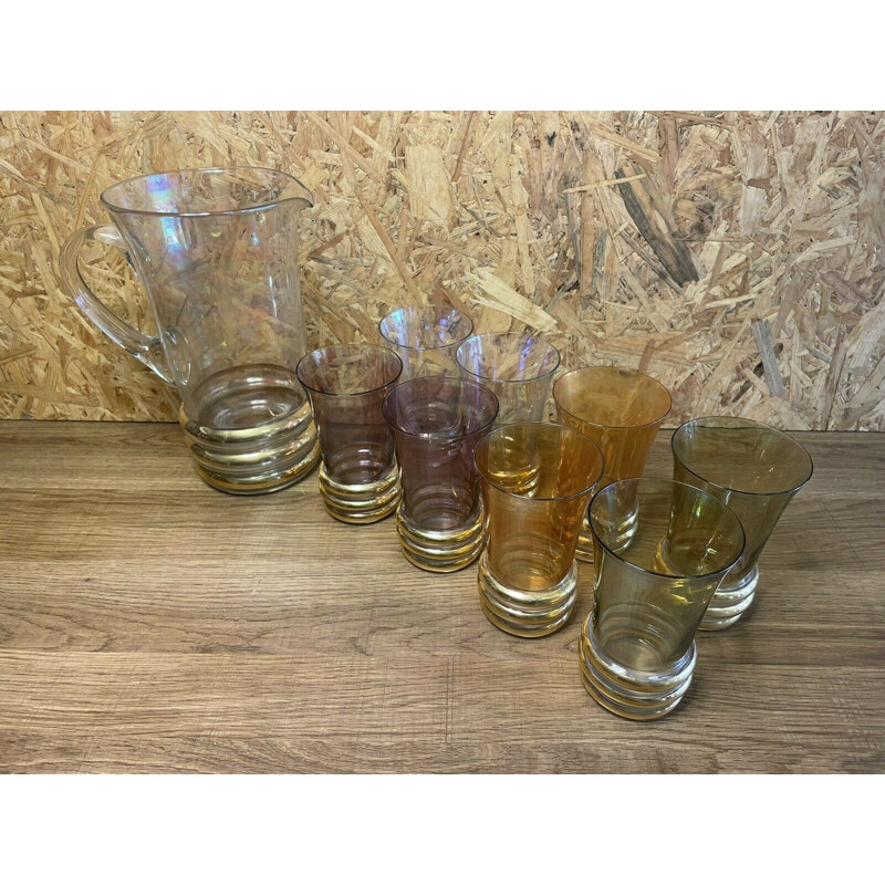 Set of pitcher and 8 vintage gold glasses