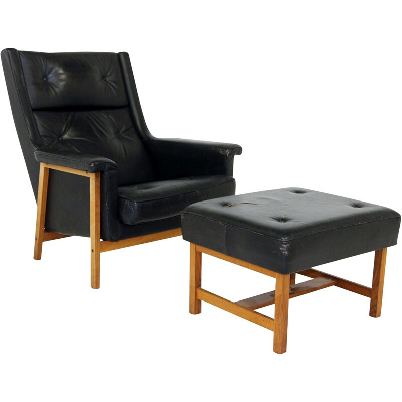 Vintage leather armchair with footrest by Karl Erik Ekselius, Sweden 1960