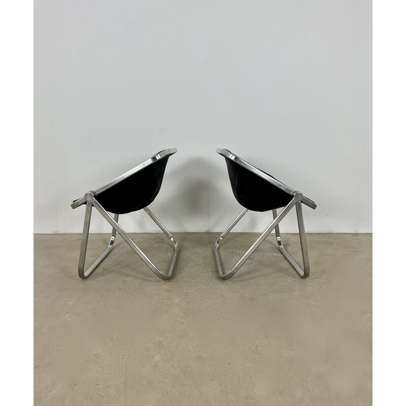Pareja de sillones vintage Plona en cuero y metal de Giancarlo Piretti para Castelli, 1970