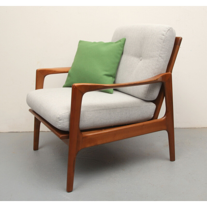 Vintage armchair in cherrywood with green cushion, 1960s