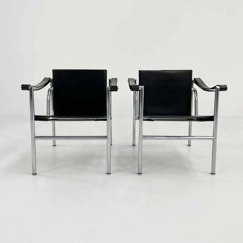 Pair of vintage Lc1 armchairs in black leather by Le Corbusier for Cassina, 1970s