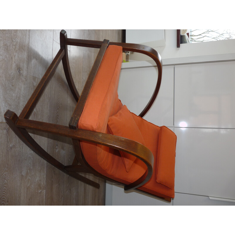 Hergestoffeerde schommelstoel met oranje stof - 1950