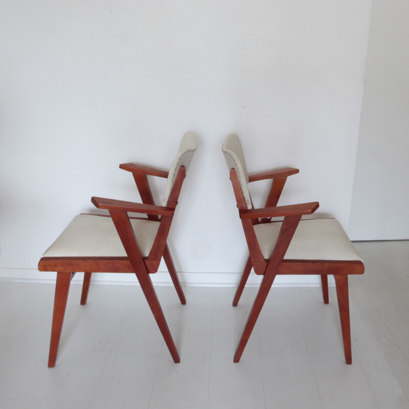 Paire de fauteuils en bois et simili cuir beige - 1950
