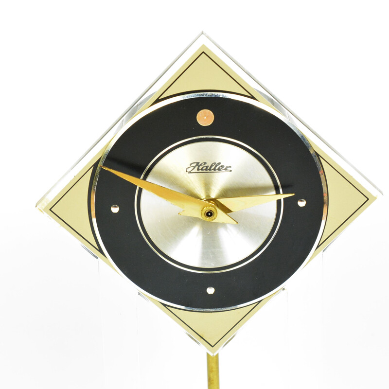 Vintage epoxy, brass, steel and plastic space age mantel clock by Haller, Germany 1960