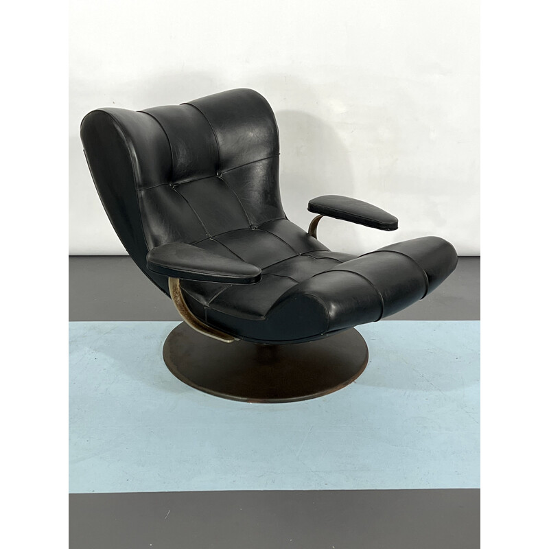 Vintage Italian black swivel armchair by Tecnisalotto, 1960