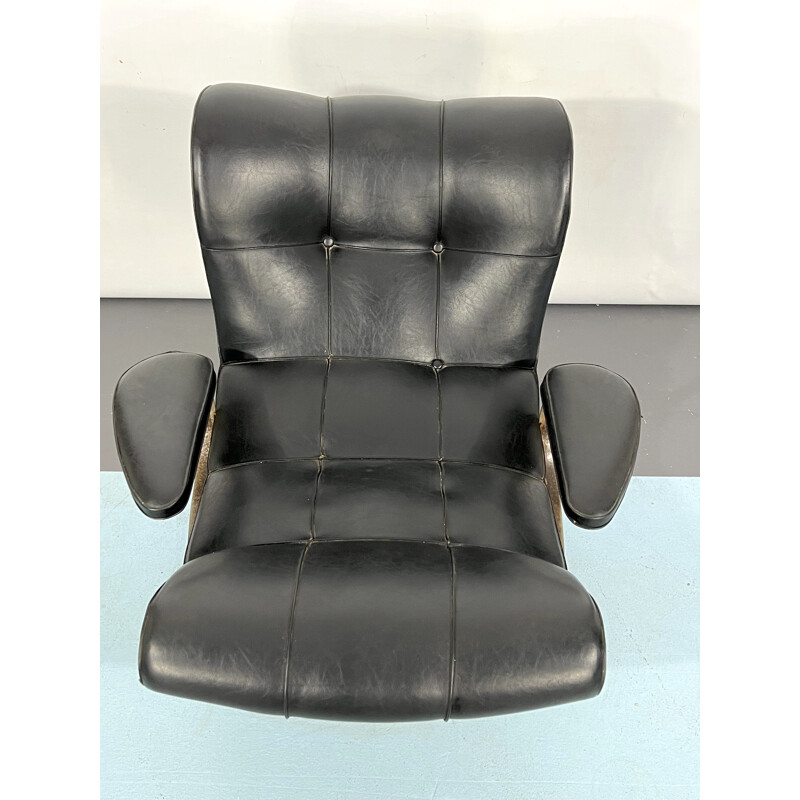 Vintage Italian black swivel armchair by Tecnisalotto, 1960