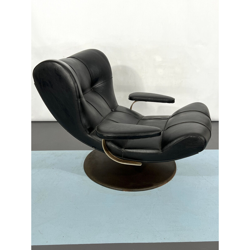 Vintage Italian black swivel armchair by Tecnisalotto, 1960