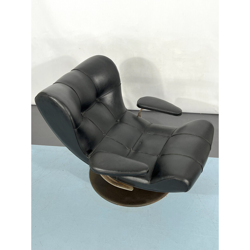 Vintage Italian black swivel armchair by Tecnisalotto, 1960