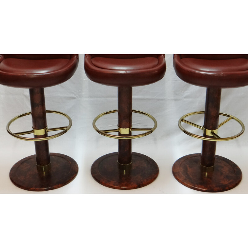 Set of 3 bar stools in red leather and brass - 1970s