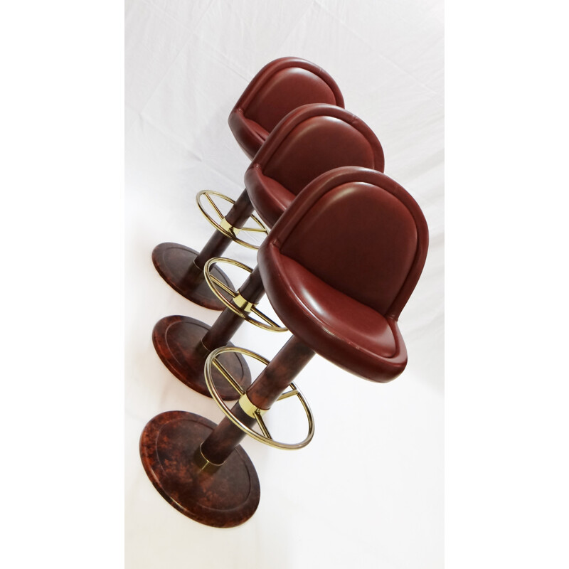 Set of 3 bar stools in red leather and brass - 1970s