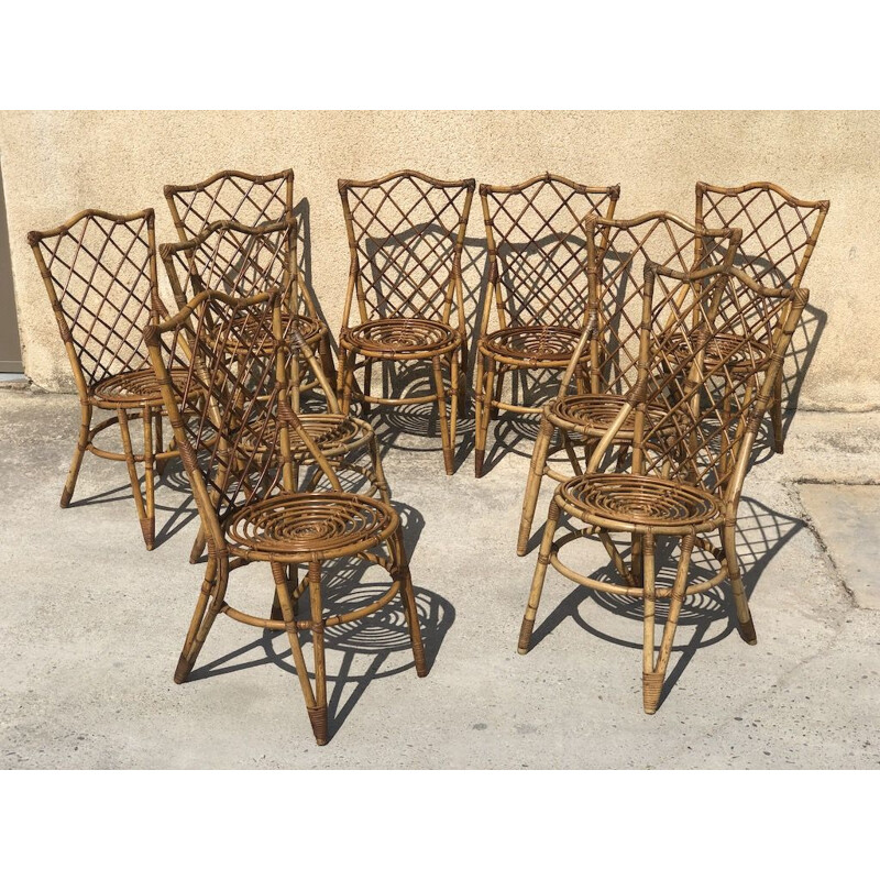 Set of 9 vintage rattan chairs by Louis Sognot, 1960