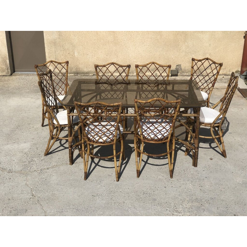 Set of 9 vintage rattan chairs by Louis Sognot, 1960