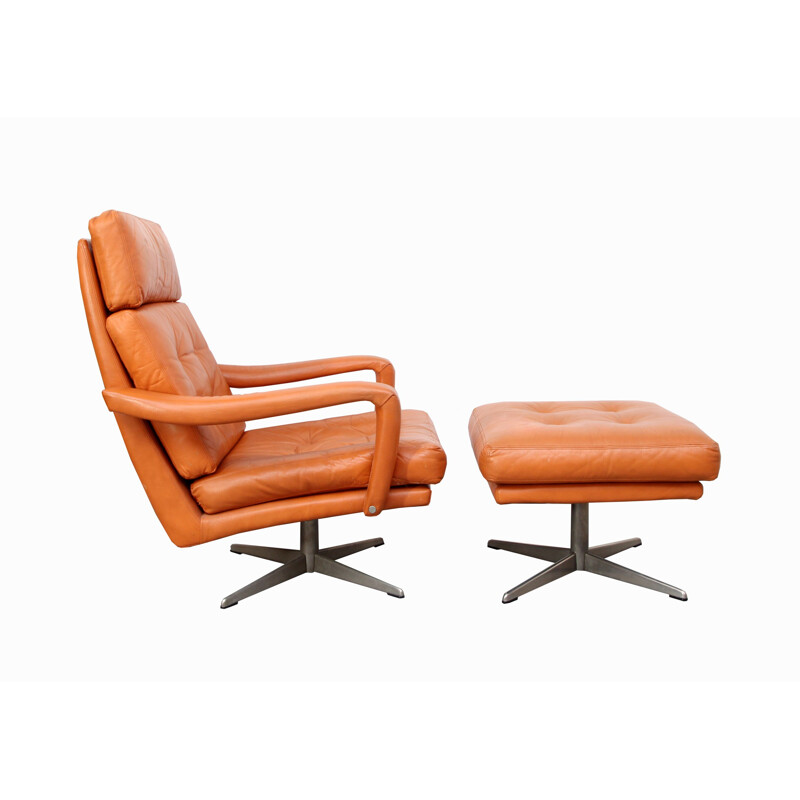 Fauteuil pivotant et son ottoman en cuir - 1970