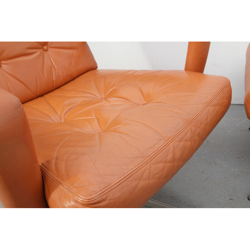 Leather swivel lounge chair with ottoman - 1970s