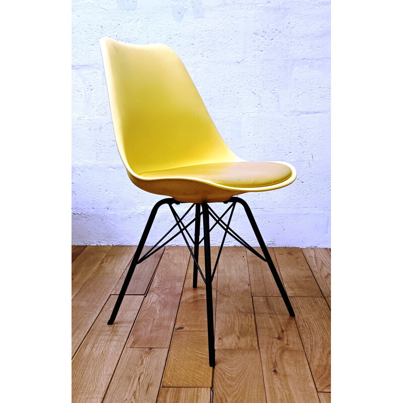 Vintage yellow plastic chair