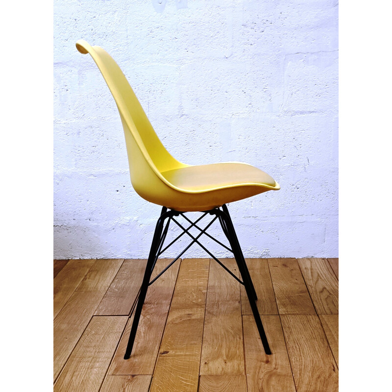 Vintage yellow plastic chair