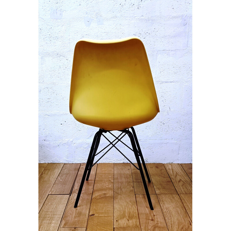 Vintage gele plastic stoel